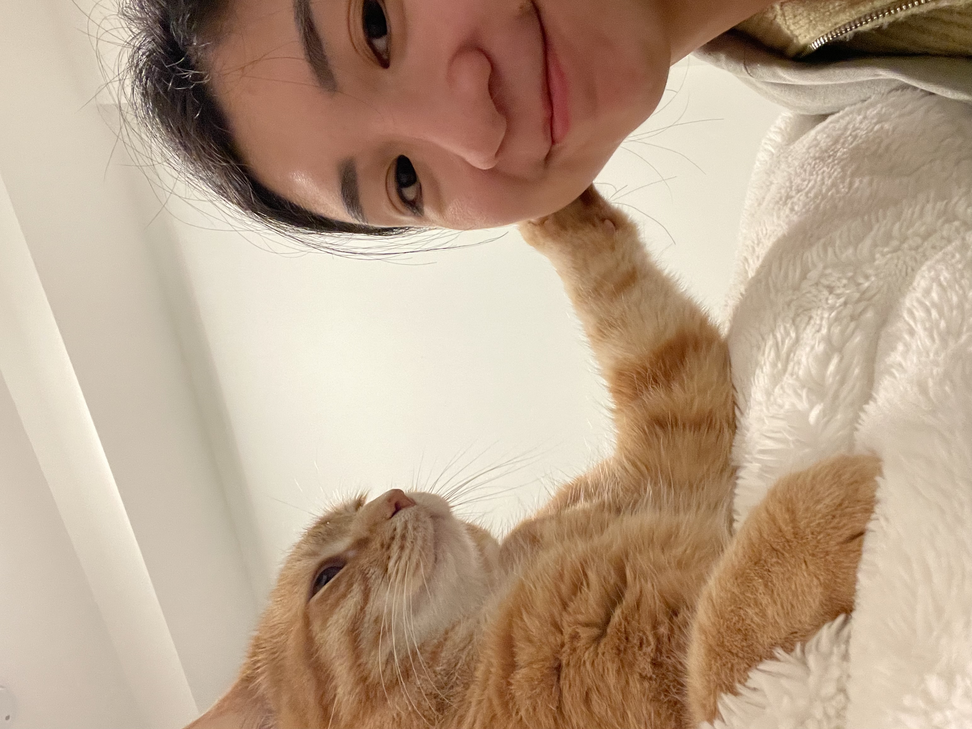 Penny with Lulu, her large ginger cat